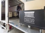 National Library of Australia collection box being loaded onto a truck